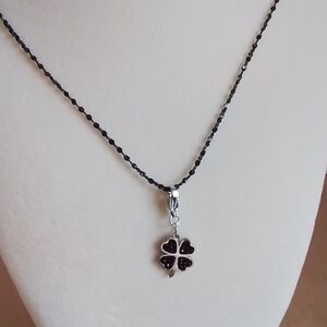 Elegant Silver and Black Clover Pendant Necklace